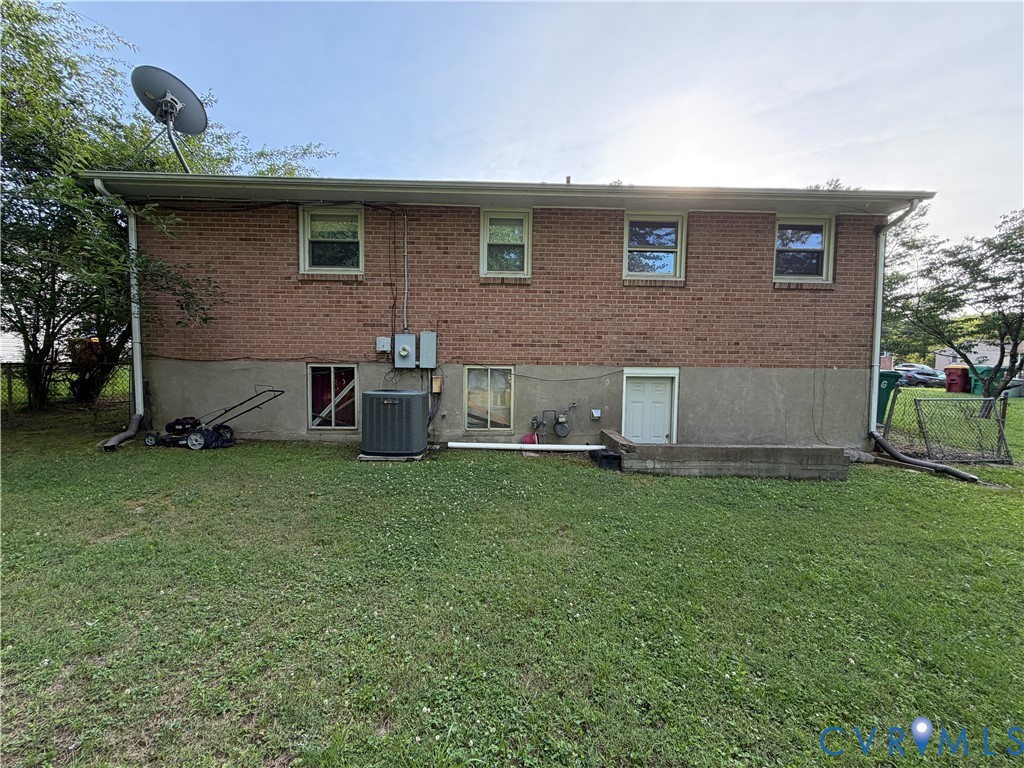 Brick exterior finish, concrete foundation, and multi-pane windows