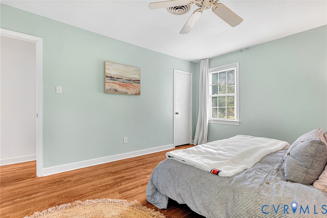 Wood-finish flooring, multi-pane window, and ceiling fan
