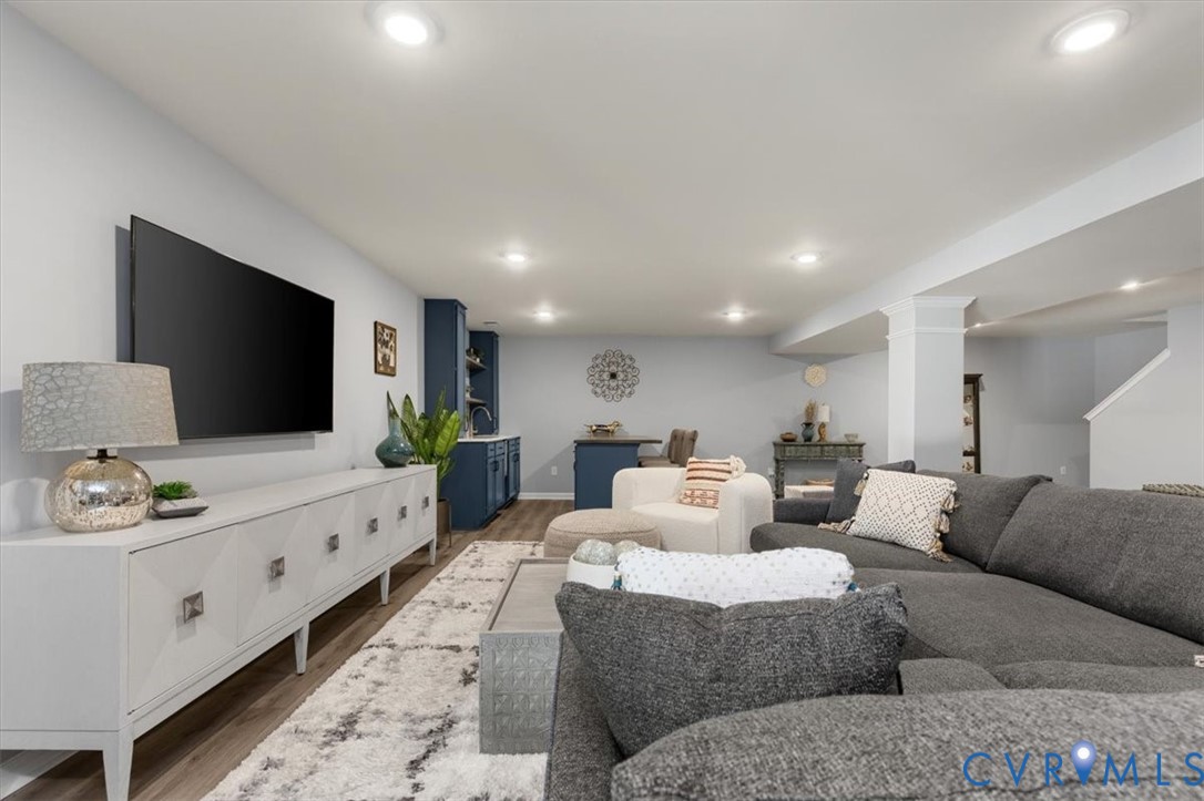 Finished basement living area, recessed lighting, Open Concept, new high end LVP