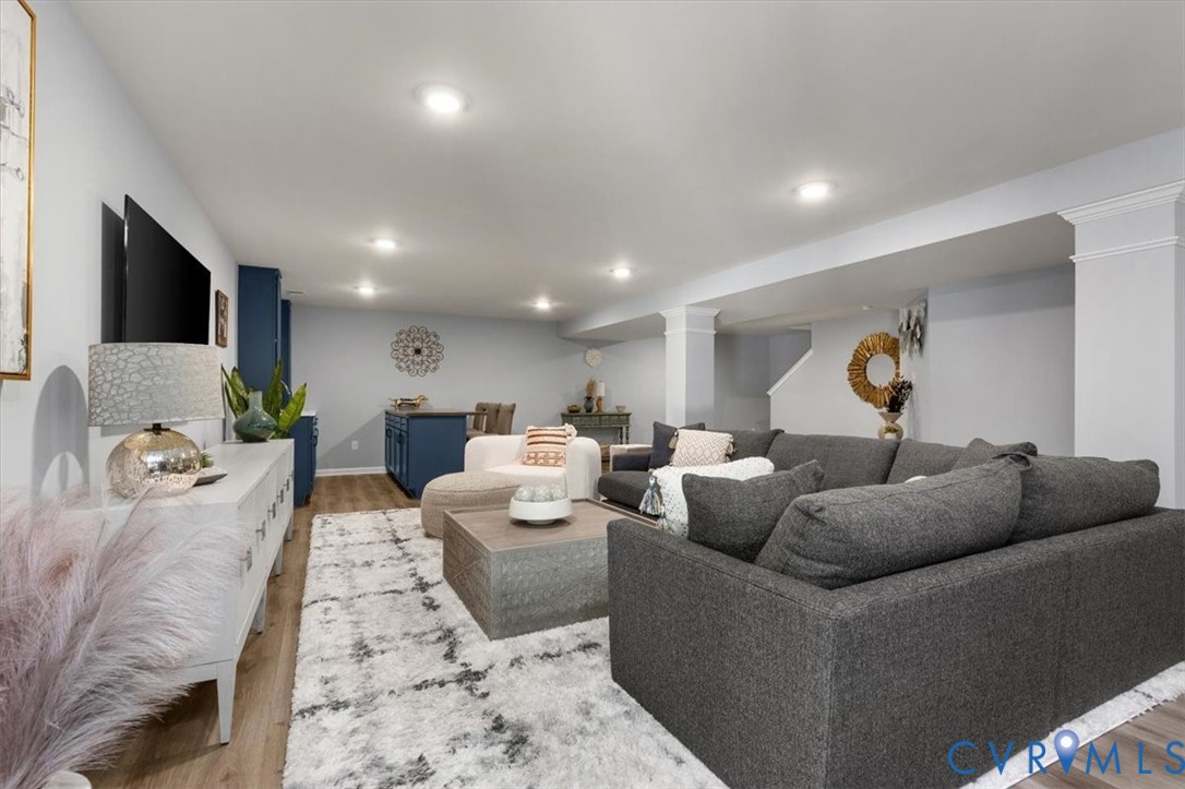 Finished basement living area, recessed lighting, Open Concept, new high end LVP