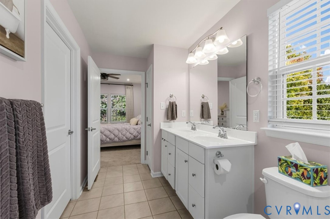 Primary En-Suite, Double Vanity, Tiled Shower, huge walk in closet