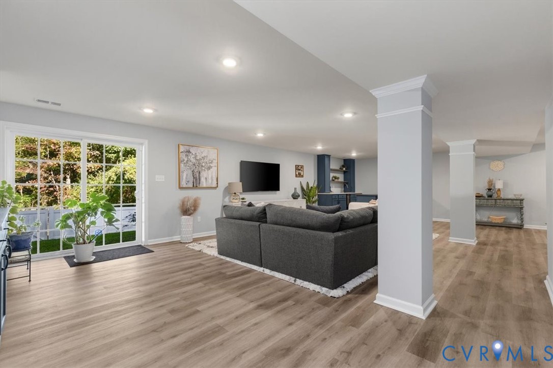 Finished basement living area, recessed lighting, Open Concept, new high end LVP