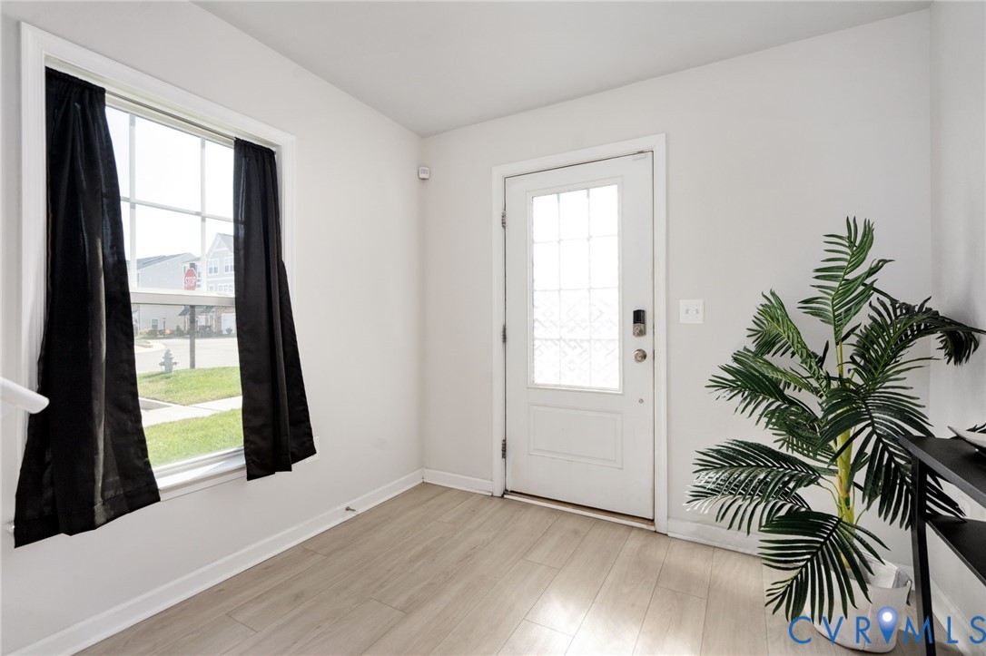 This bright first-level entryway offers an ideal spot to create a convenient drop zone for shoes, bags, and everyday essentials. This bright first-level entryway offers an ideal spot to create a convenient drop zone for shoes, bags, and everyday essentials.