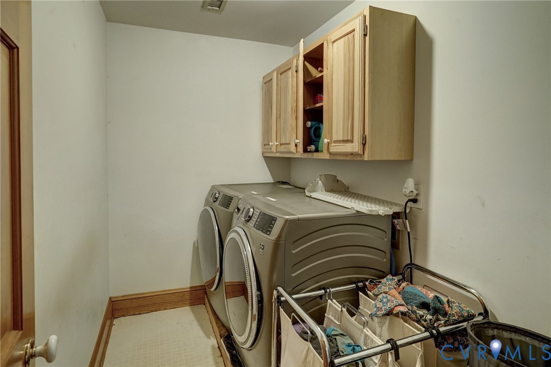 Upstairs Laundry Room w/Vinyl Flooring, Storage Cabinets