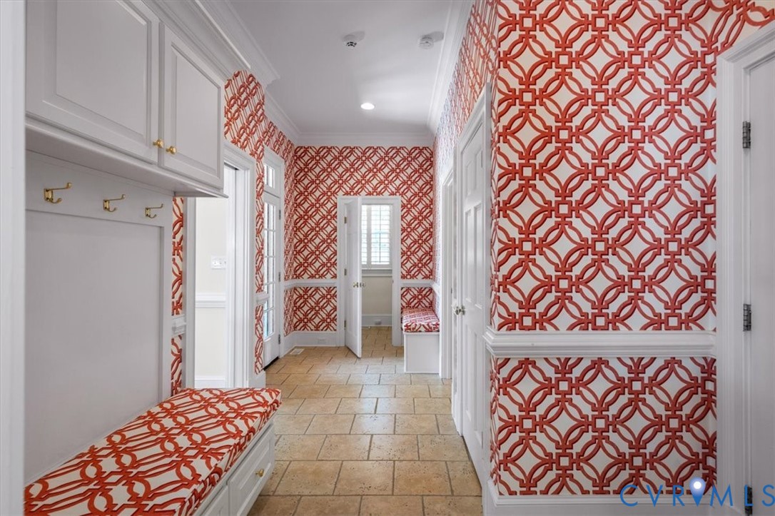 First floor Laundry room, half bath garage entry.