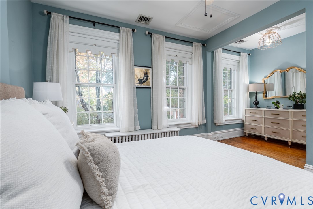 The primary bedrooms alcove adds room for a dresser or desk.
