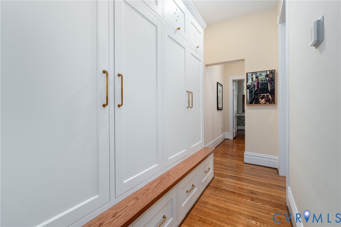 Mudroom with custom built-ins by Anne Pulliam Interiors, added in 2025.