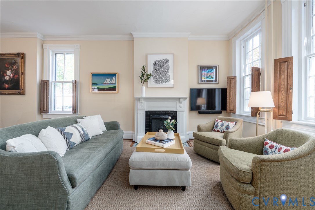 Because the house is detached, the living room has windows on 2 walls. Because the house is detached, the living room has windows on 2 walls.