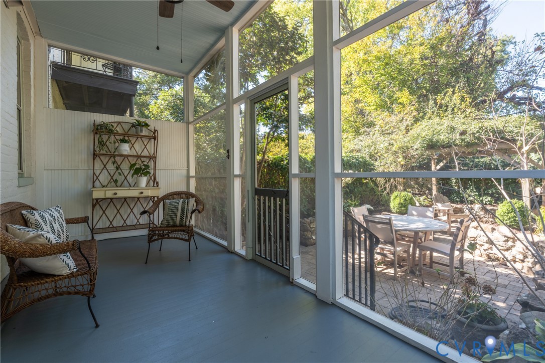 Screened porch off the kitchen, overlooking the garden.