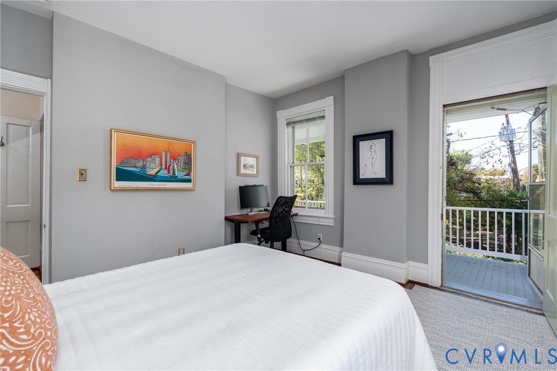 The third bedroom opens to a covered porch.