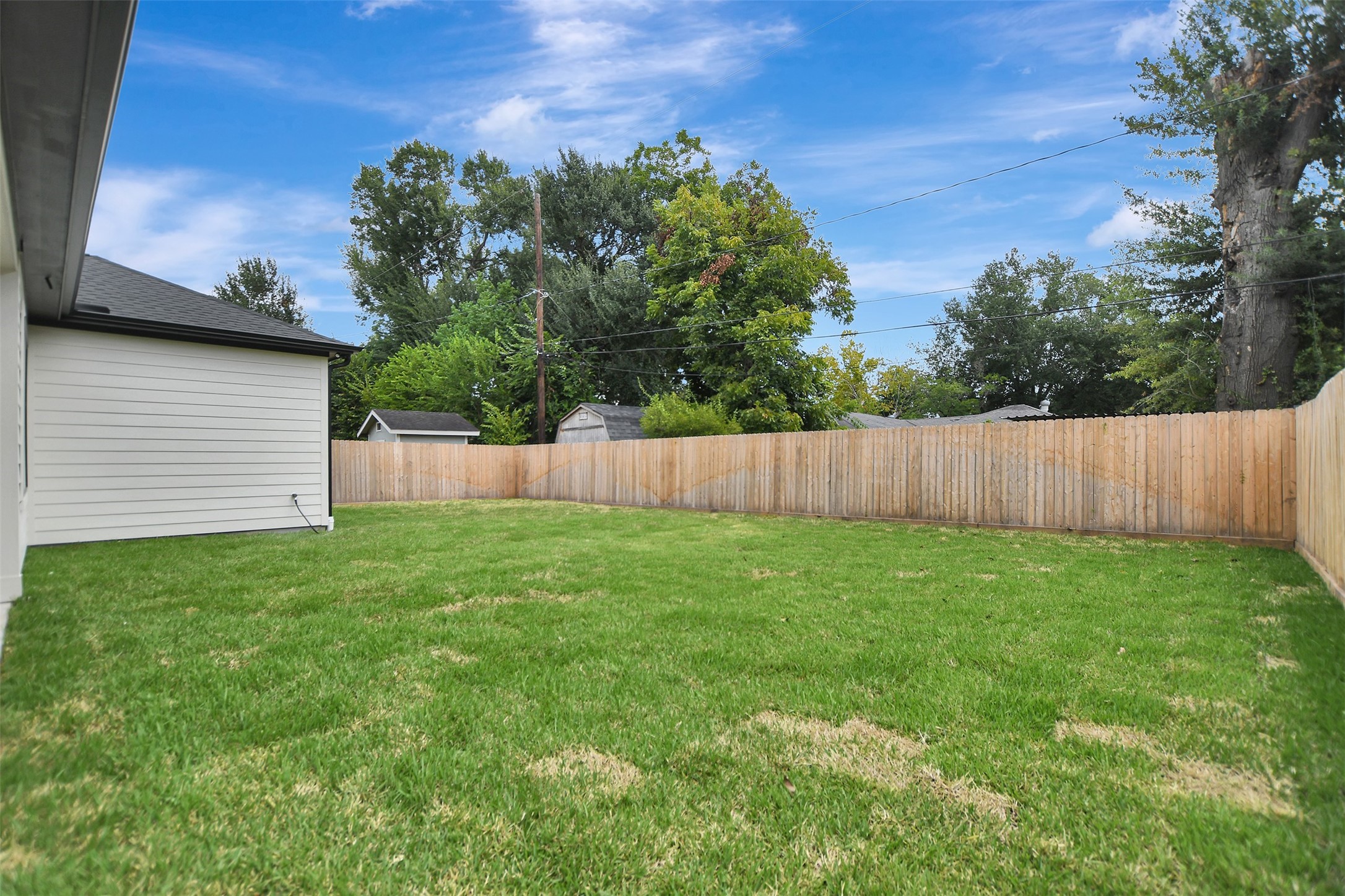 LARGE FENCED BACKYARD