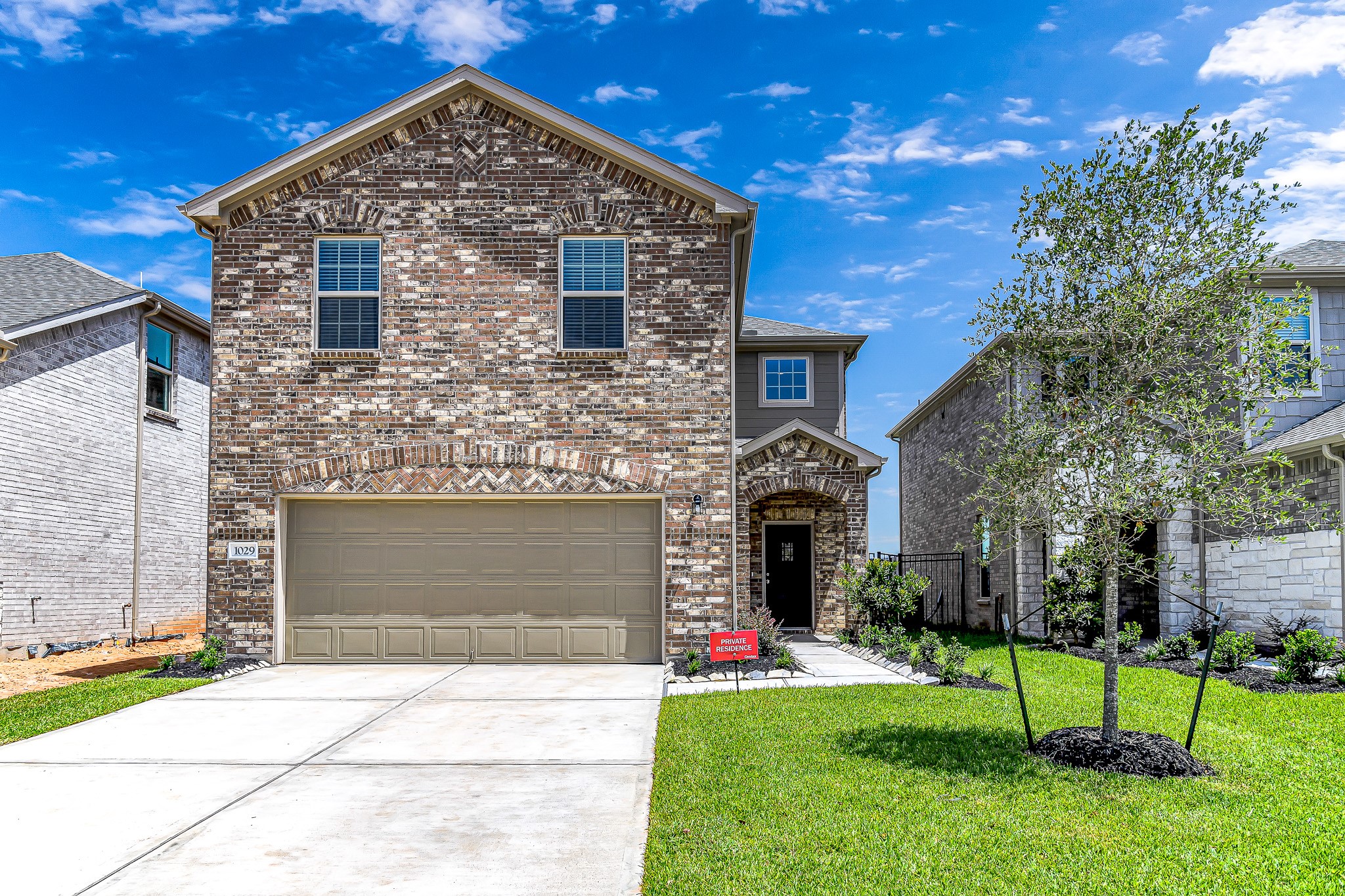 Elegant curb appeal. Brick at all 4 elevations.