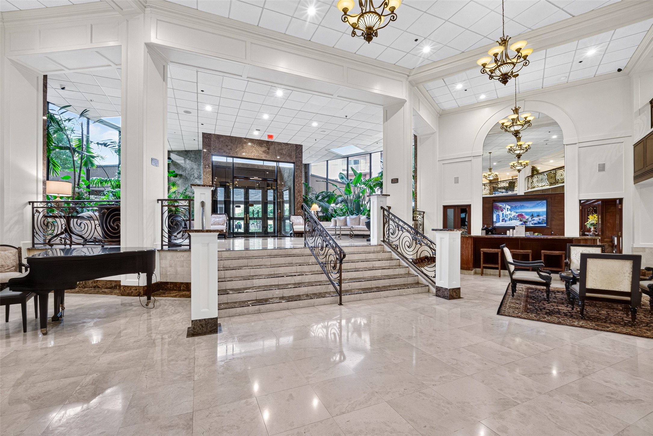 Another view of the lobby area with complimentary coffee bar, party room access, mail room, exercise room and designated private workstations all located on the first floor Another view of the lobby area with complimentary coffee bar, party room access, mail room, exercise room and designated private workstations all located on the first floor
