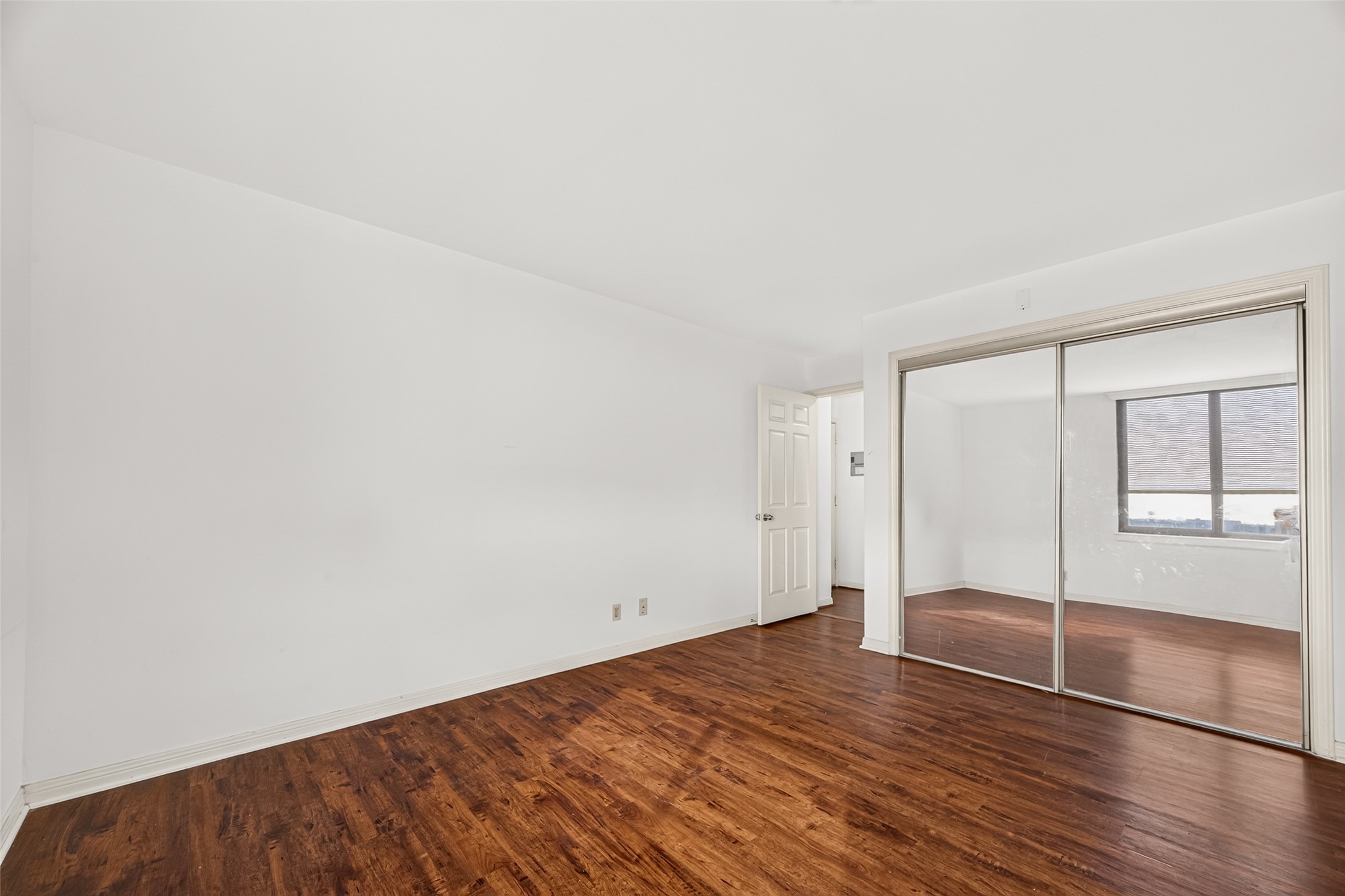 Another view of the secondary bedroom with full size closet