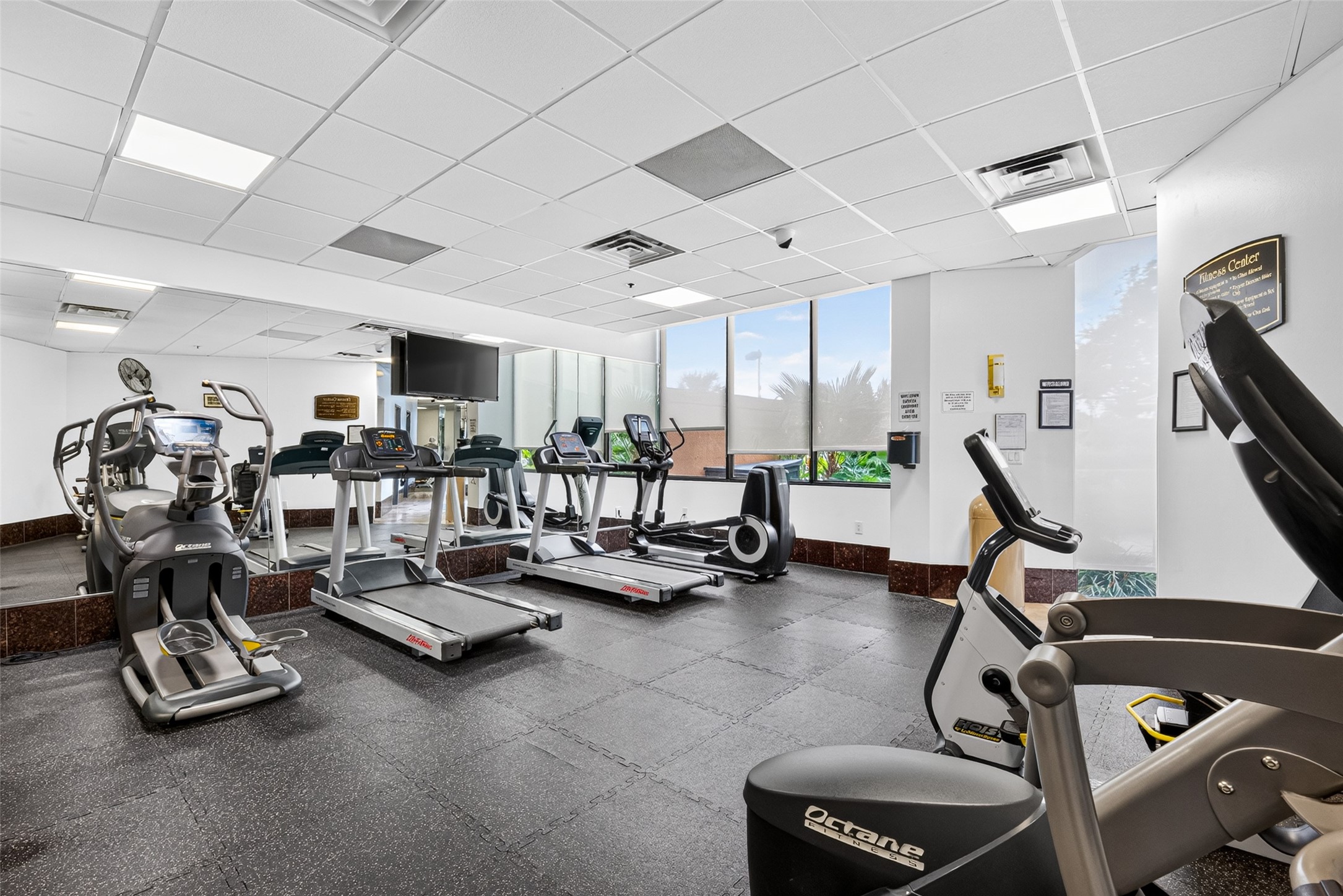 Gym located on the 1st floor inside from the private pool