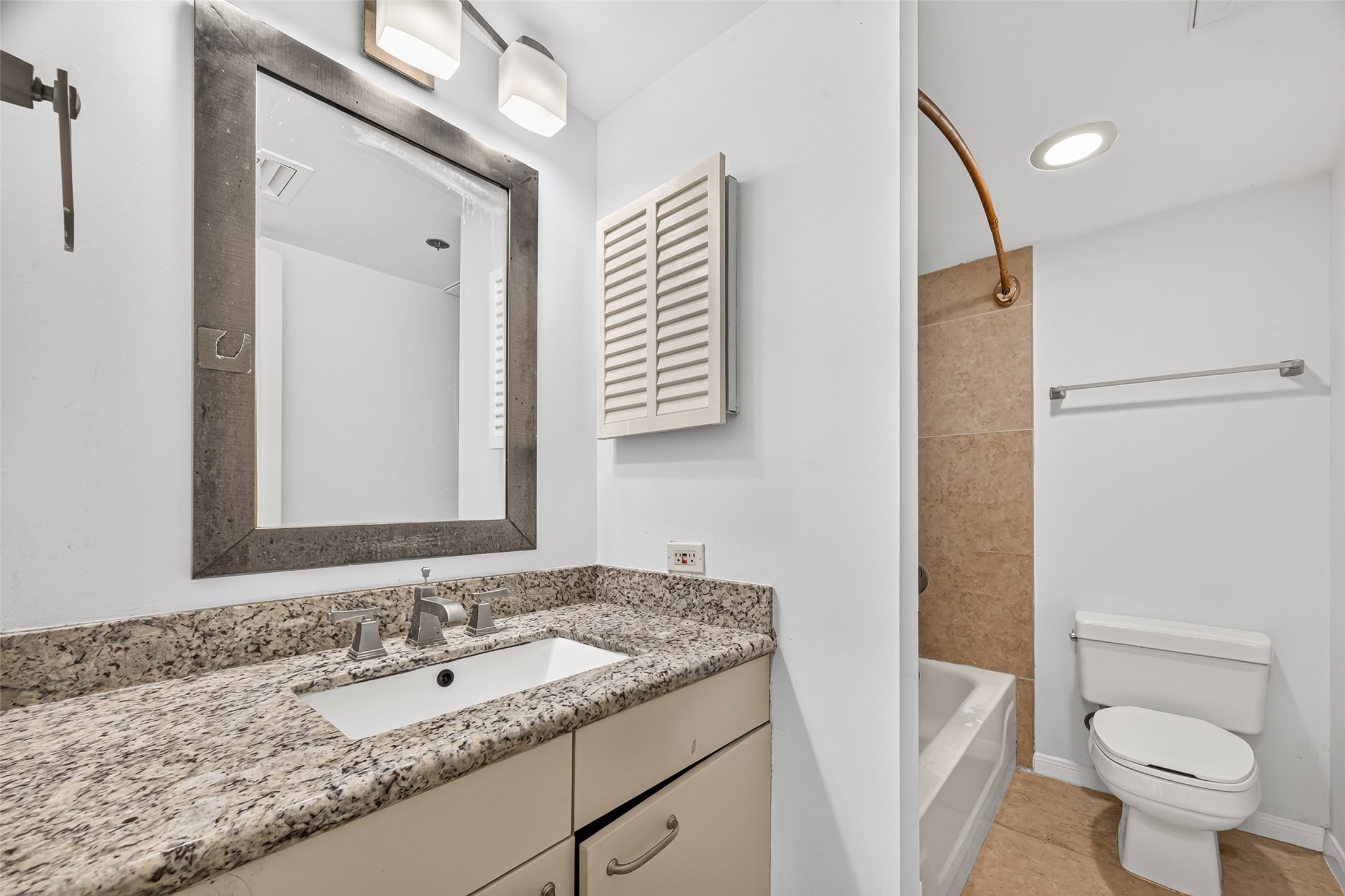 Full bathroom located to your left as you enter the condo
