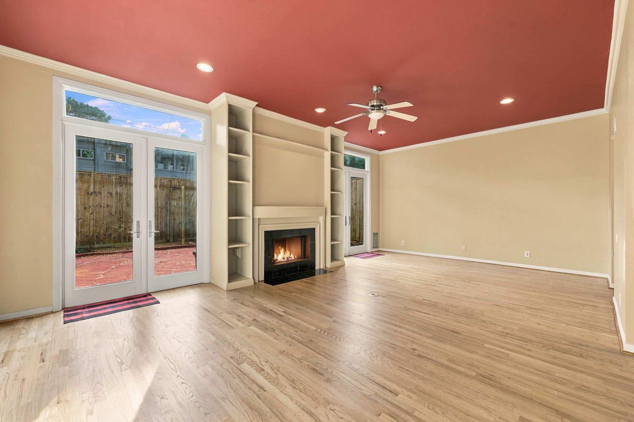1st Floor: view of fireplace and entrance to backyard.