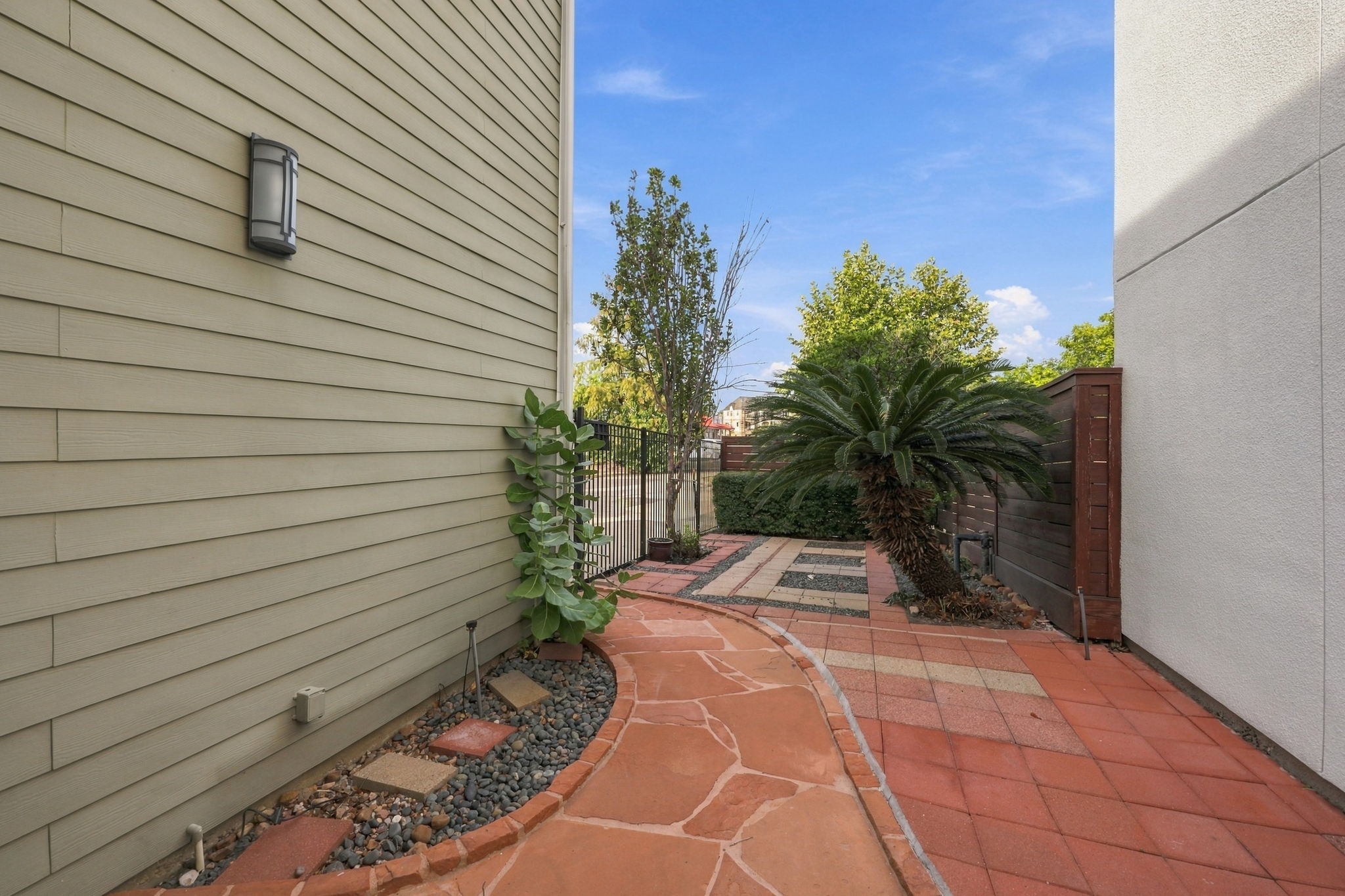 Gated Front and Side yard of house.