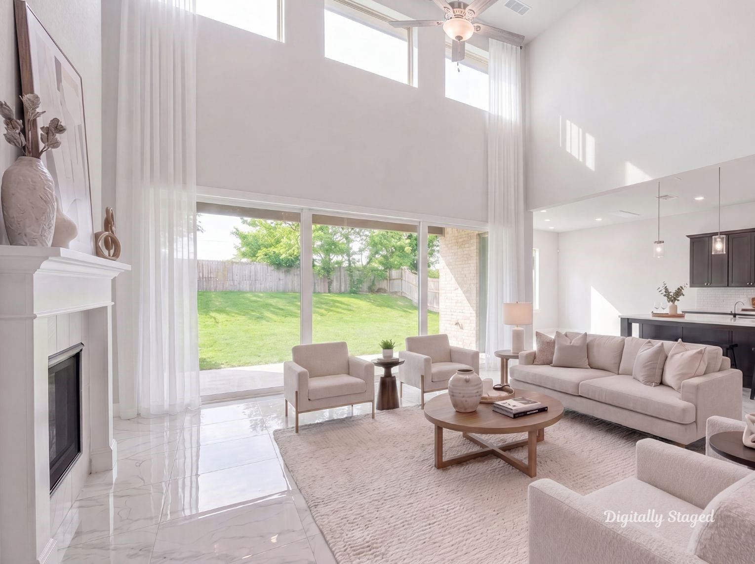 A breathtaking, two-story
living room with soaring ceilings,
polished tile floors, a seamless flow
into the open kitchen, and a wall of
windows featuring sliding glass doors
that open all the way to the
backyard. This photo has been
digitally staged to illustrate the
possibilities of the homes aesthetic
and potential design. Some
furnishings and dcor shown are for
visual inspiration.