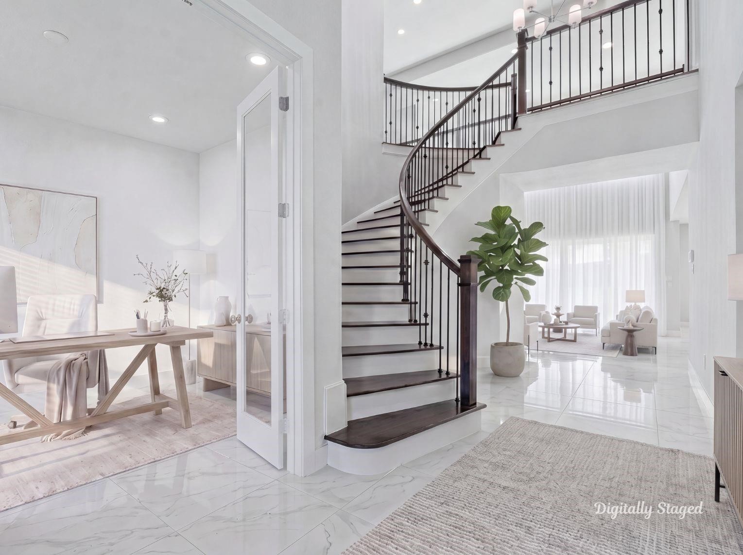 An impressive grand entry
highlighting a sweeping curved
staircase with wrought-iron spindles,
polished flooring, and a private home
office tucked behind French doors.
This photo has been digitally staged
to illustrate the possibilities of the
homes aesthetic and potential
design. Some furnishings and dcor
shown are for visual inspiration.