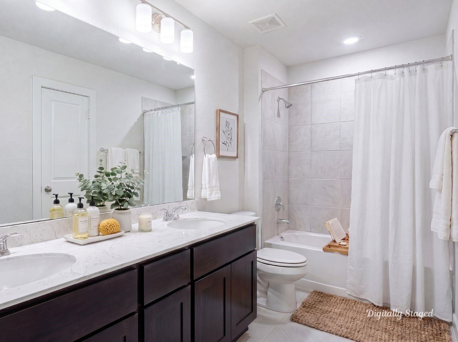 A clean and contemporary secondary
bathroom equipped with a dark wood
vanity, white countertops, and
modern grey wall tile in the shower
tub enclosure. This photo has been
digitally staged to illustrate the
possibilities of the homes aesthetic
and potential design. Some
furnishings and dcor shown are for
visual inspiration.