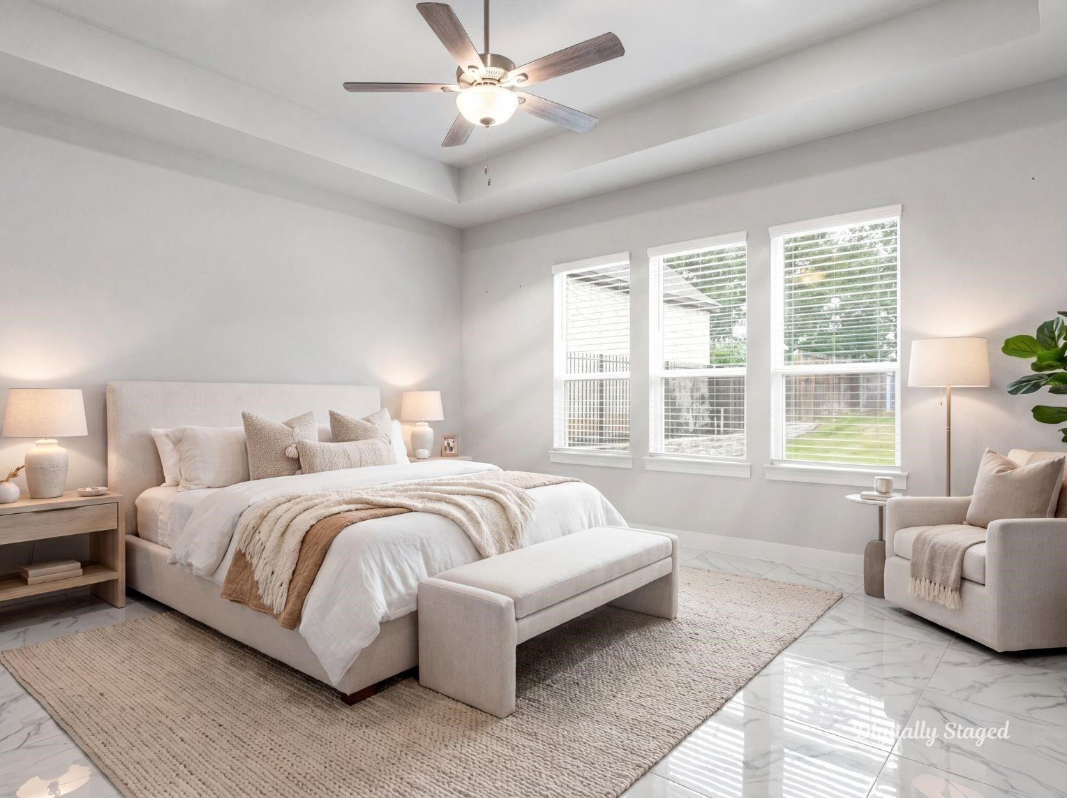 A generous primary suite featuring a
tray ceiling, large windows
overlooking the backyard, polished
tile flooring, and plenty of space for a
sitting area. This photo has been
digitally staged to illustrate the
possibilities of the homes aesthetic
and potential design. Some
furnishings and dcor shown are for
visual inspiration.