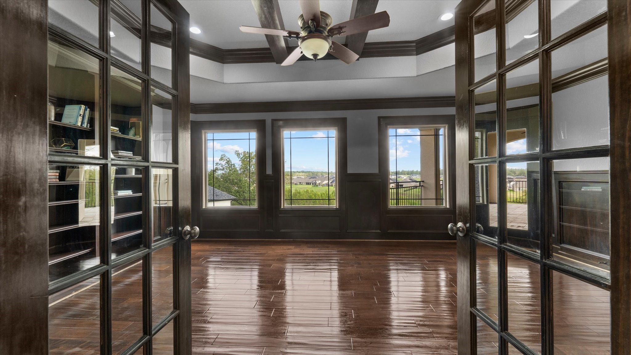 Though the home has many areas to study and work, this is the main study/office area.  Entering through french doors, you have an amazing view.  This room also has a balcony attached.