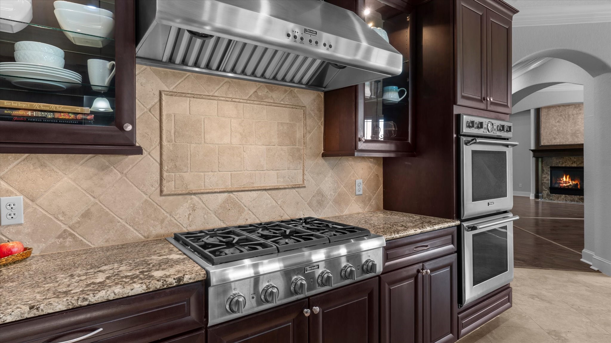 Gas Thermador stove with double-ovens.