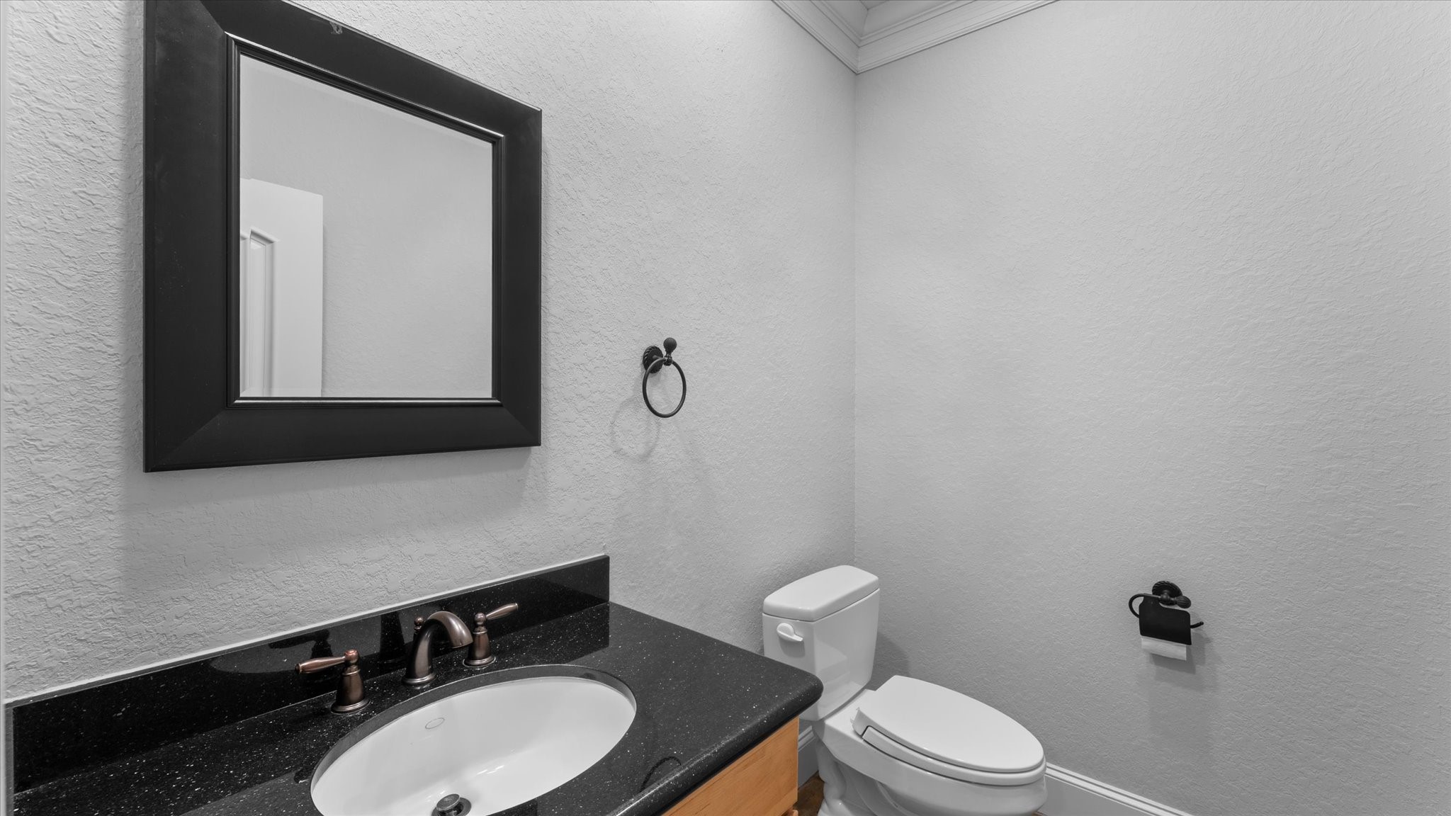 Half bath off media room.