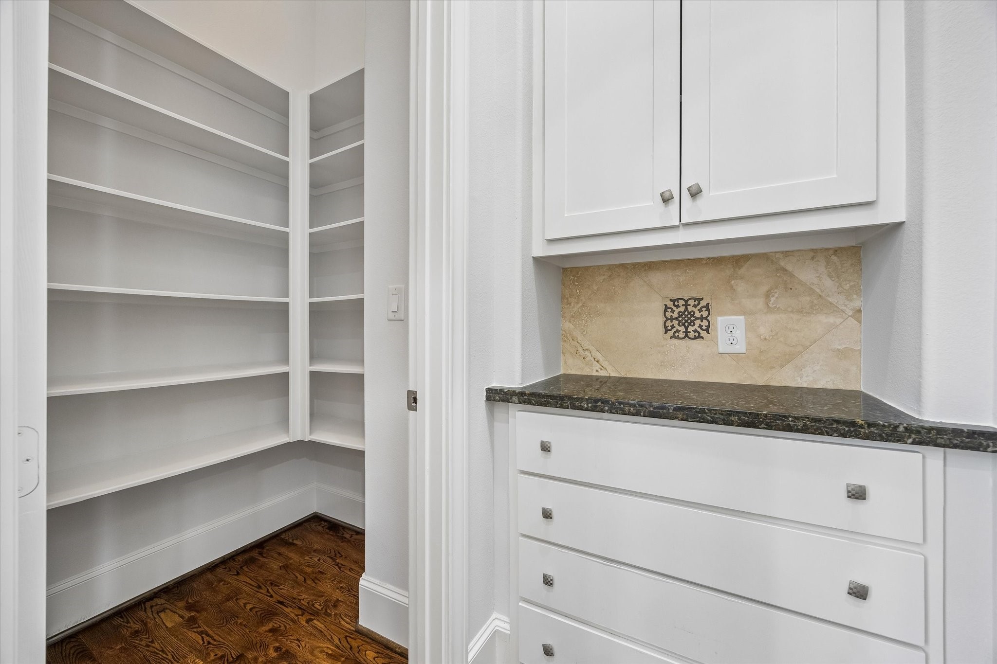 Beautiful buffet and large walk-in pantry, just off the kitchen.