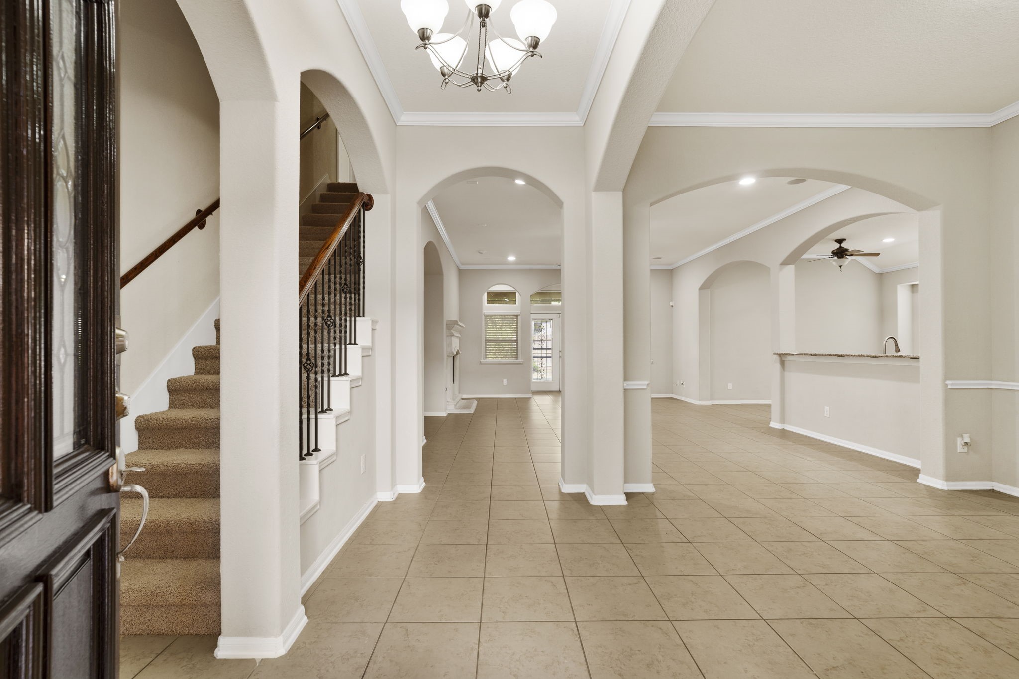 Elegant arched entryways add architectural character and timeless charm, creating graceful transitions between rooms and enhancing the homes distinctive design. Elegant arched entryways add architectural character and timeless charm, creating graceful transitions between rooms and enhancing the homes distinctive design.