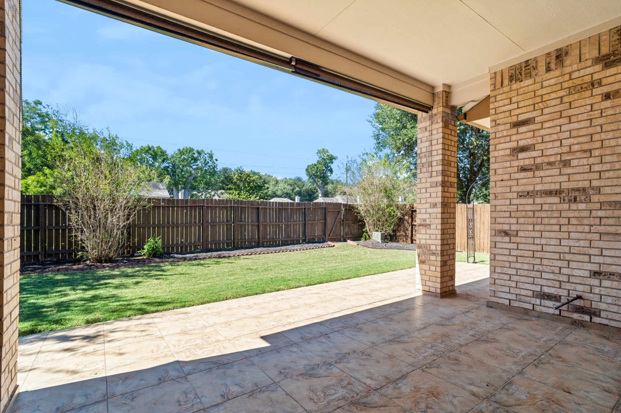 Enjoy year-round outdoor dining on the covered back patio, complete with a natural gas connection for added convenience.