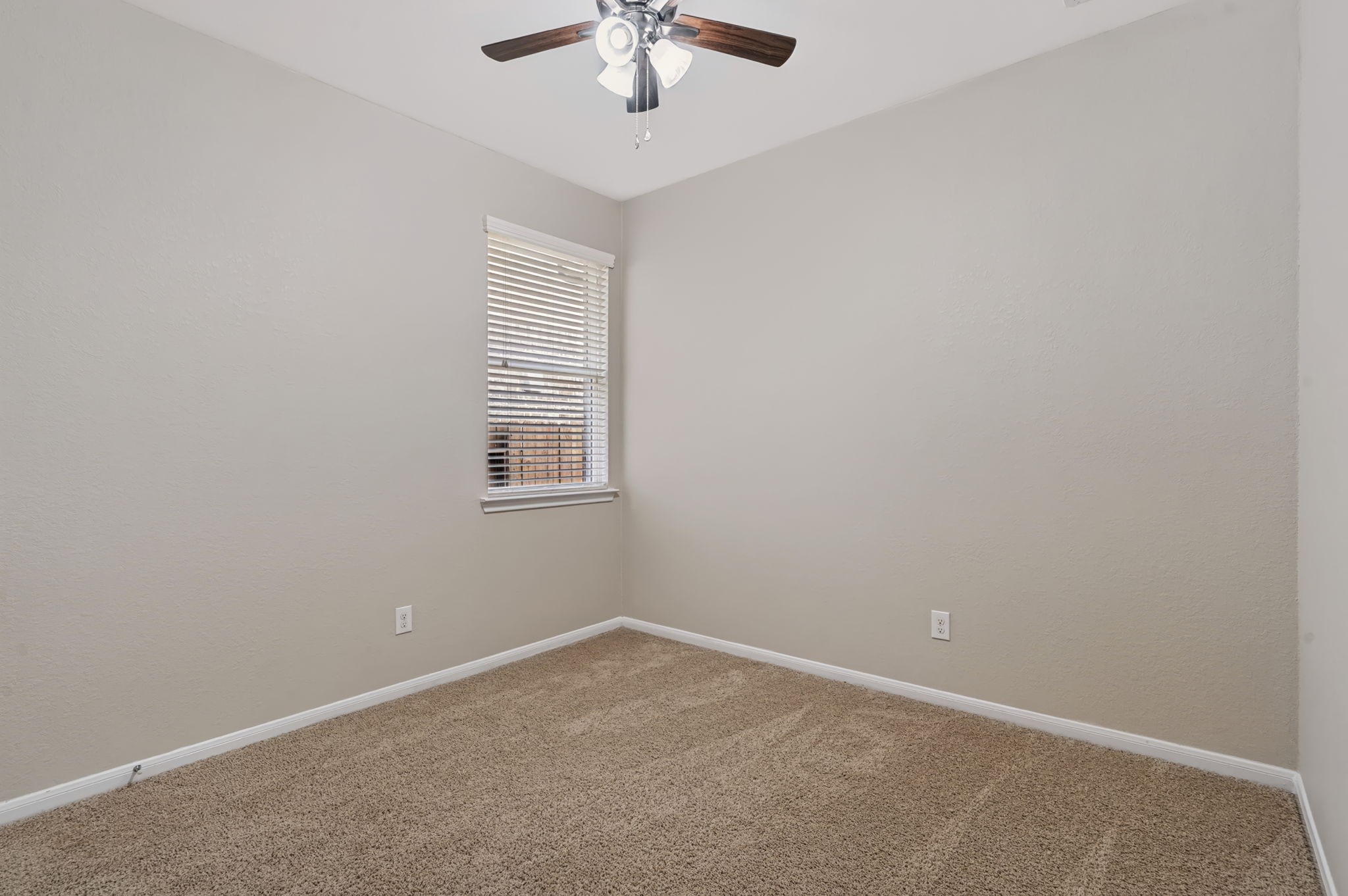 Cozy secondary bedroom perfect for family or guests.