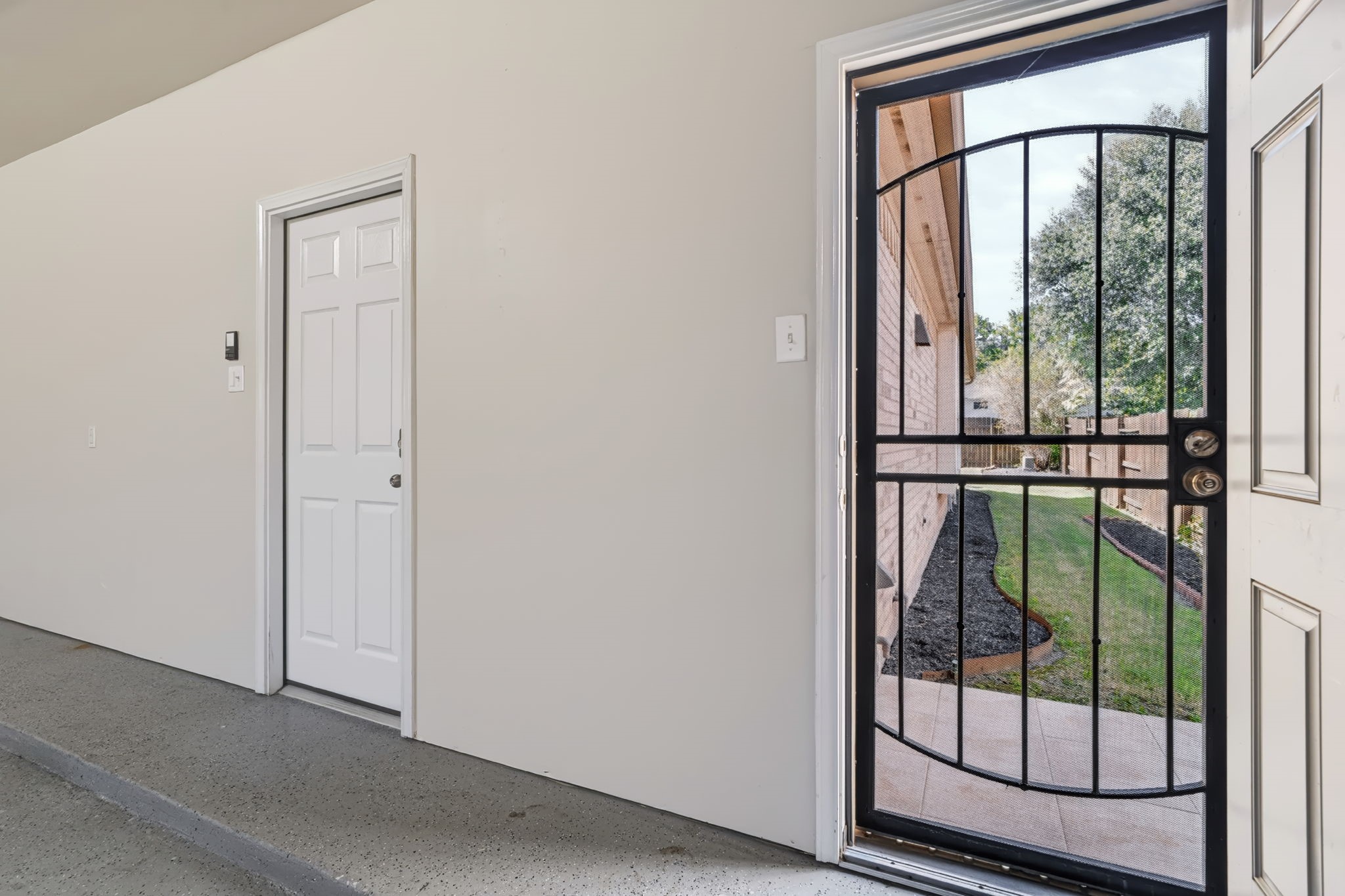 Convenient access to the side yard through a door from the garage.