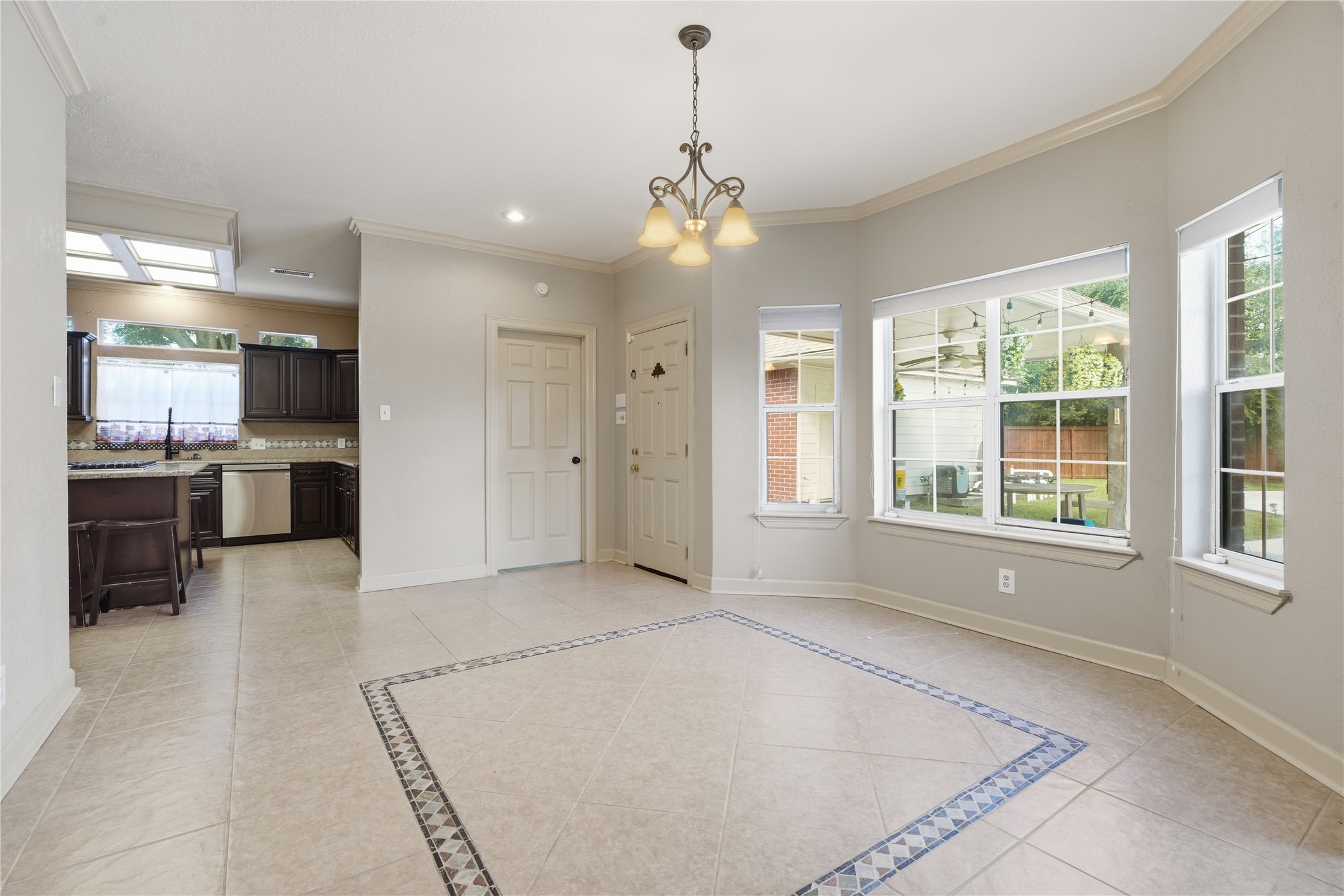 Large dining area off kitchen and Den Large dining area off kitchen and Den