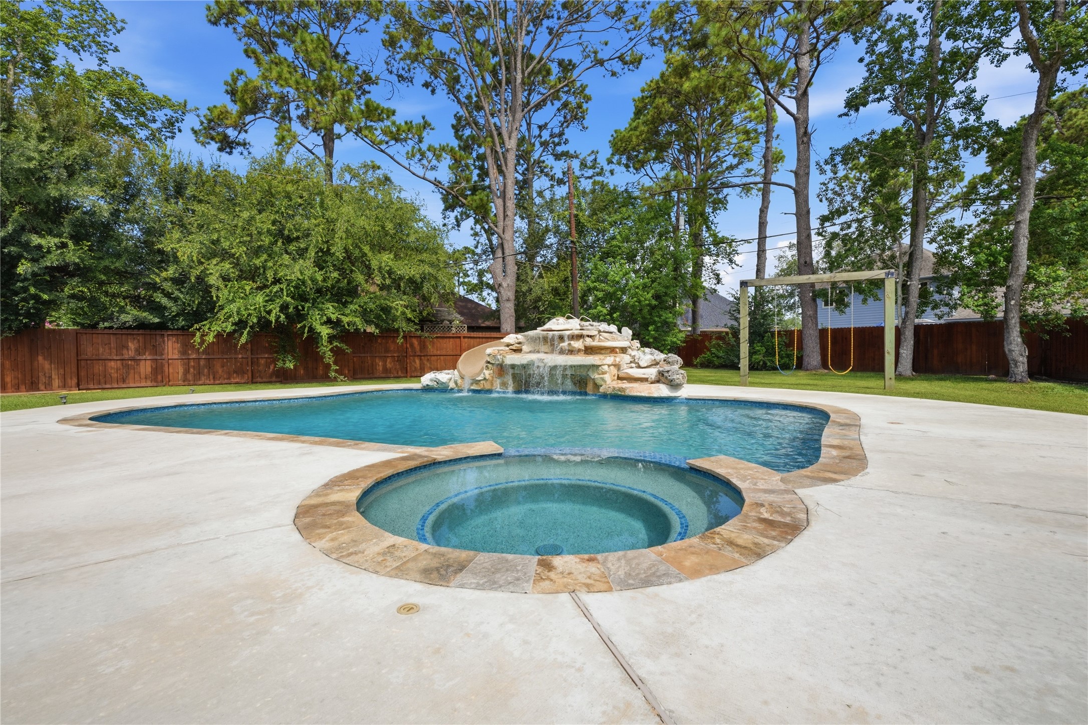 Pool with waterfall and slide