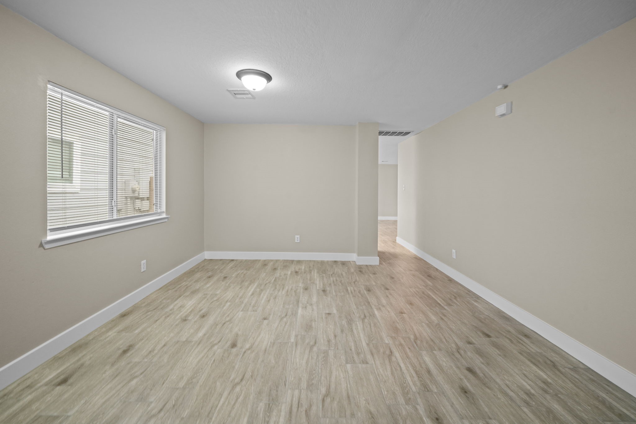Flexible front room can be used for formal dining, home office, game room, etc.
