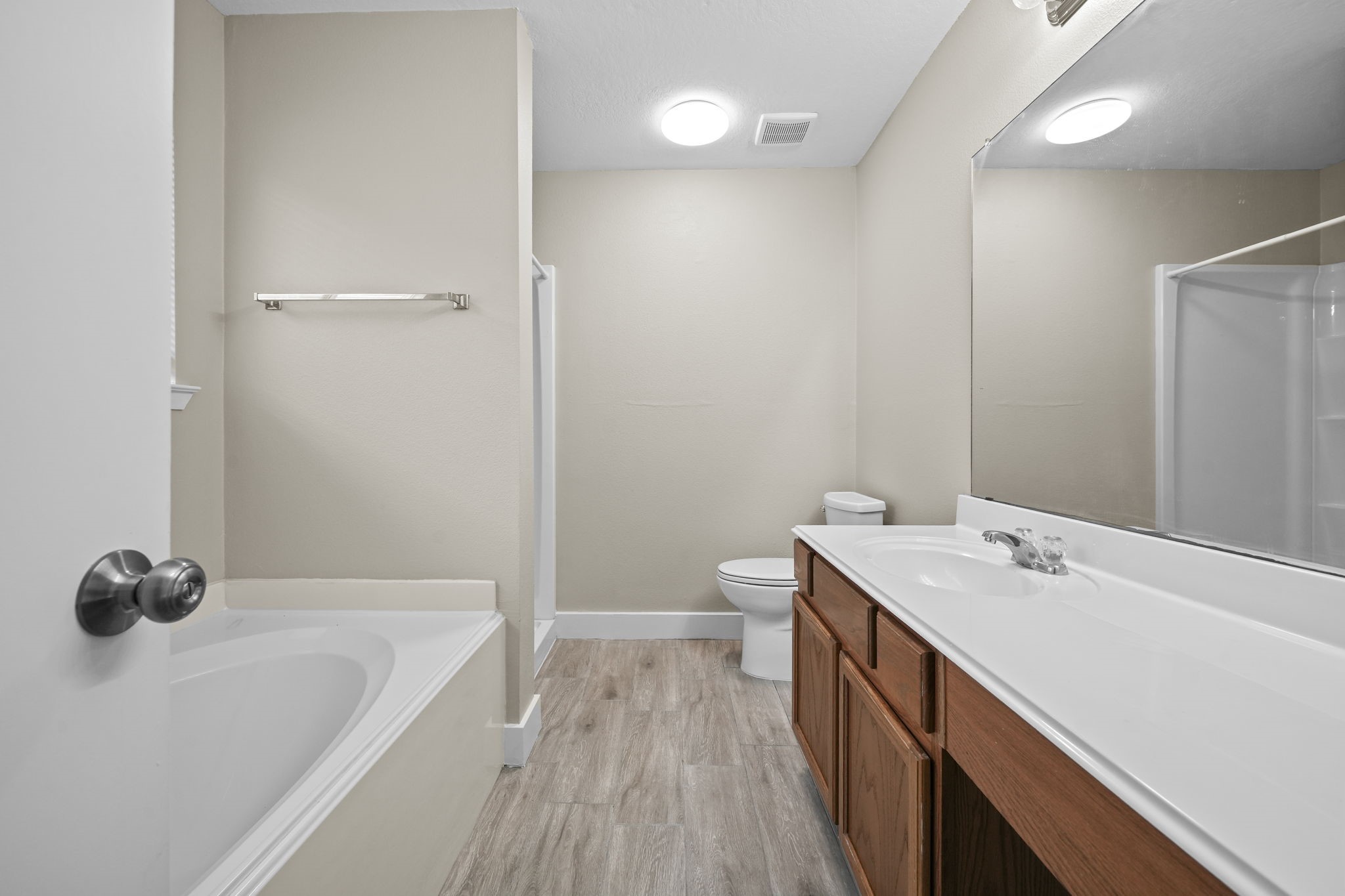 Master bathroom with soaking tub and separate shower