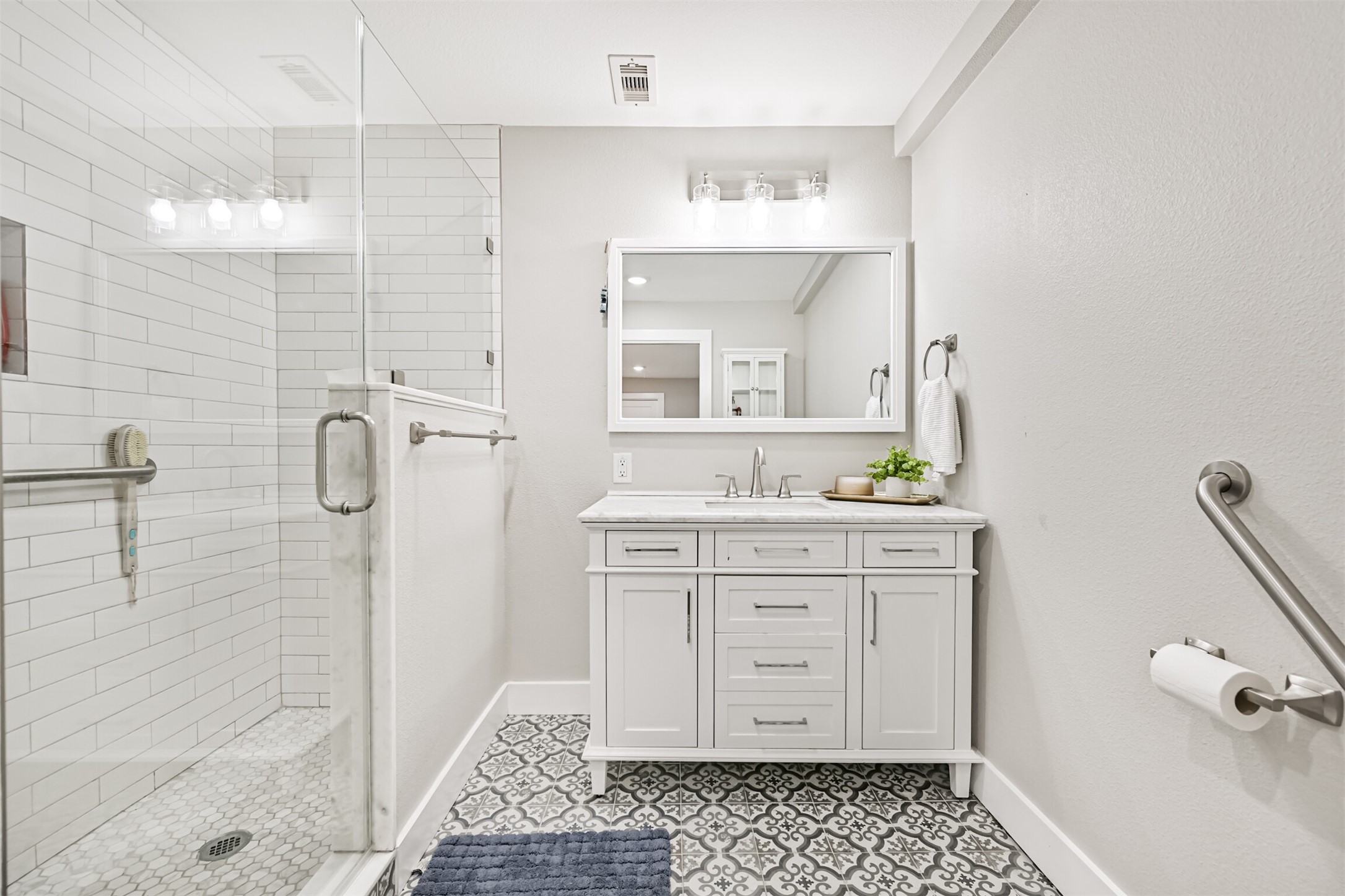 Primary bath with large walk in shower.