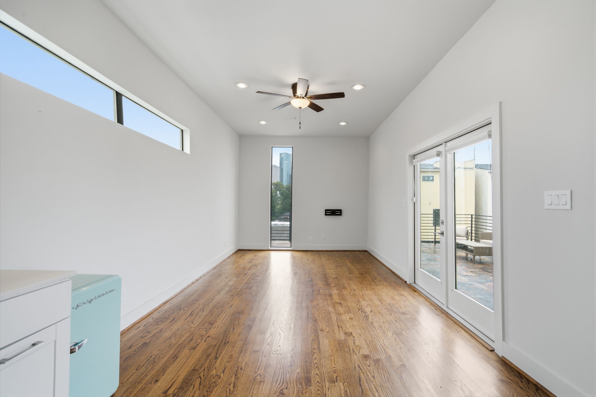 4th floor - game room + HUGE ROOFTOP DECK with DOWNTOWN views! There is also a half bath on this floor, making it super convenient whilst entertaining friends and family
