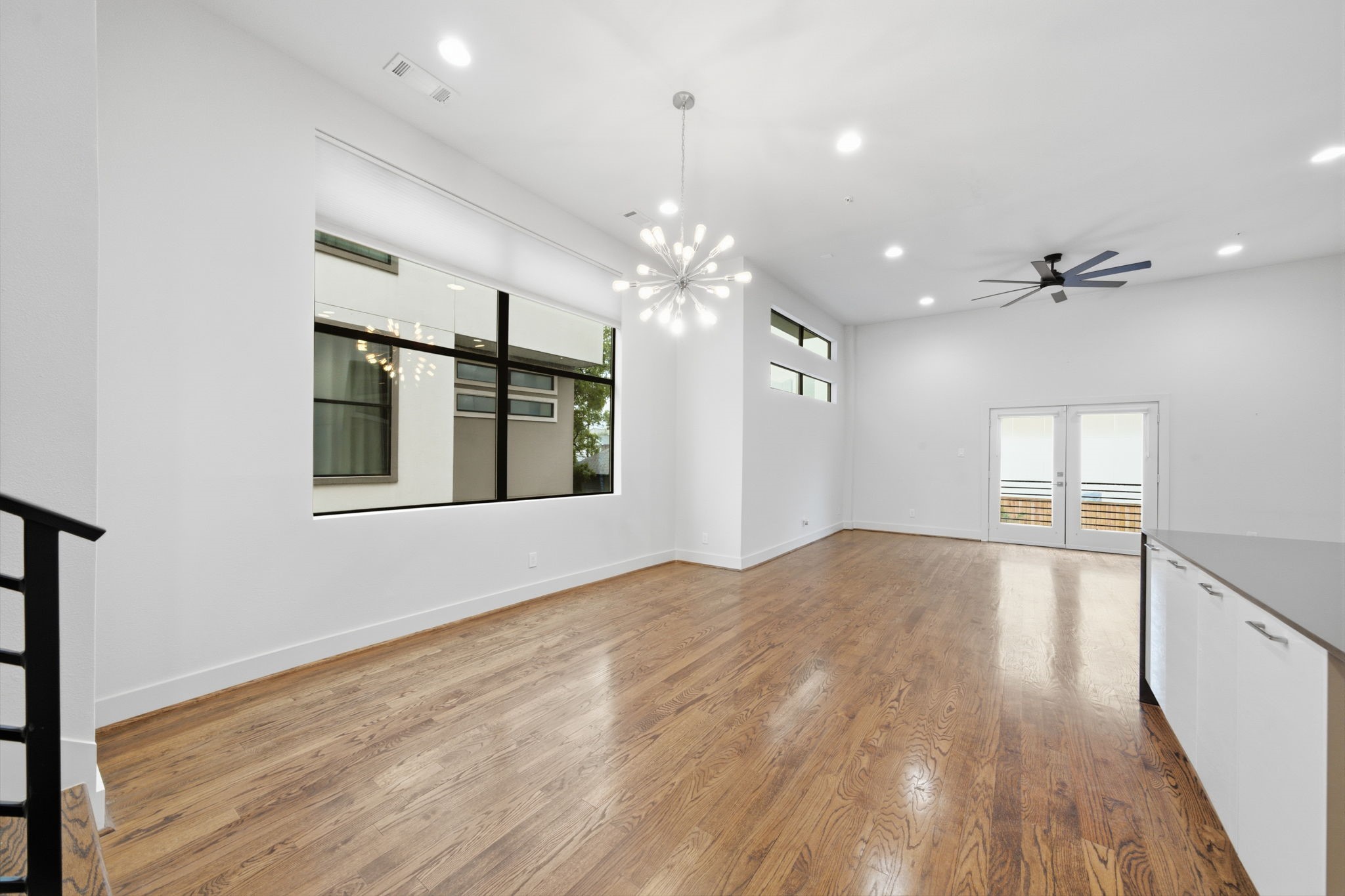 One last look at the OPEN PLAN Living-Dining-Kitchen! The combination of fresh white walls, TALL ceilings and lots of windows make this space feel so light and airy!