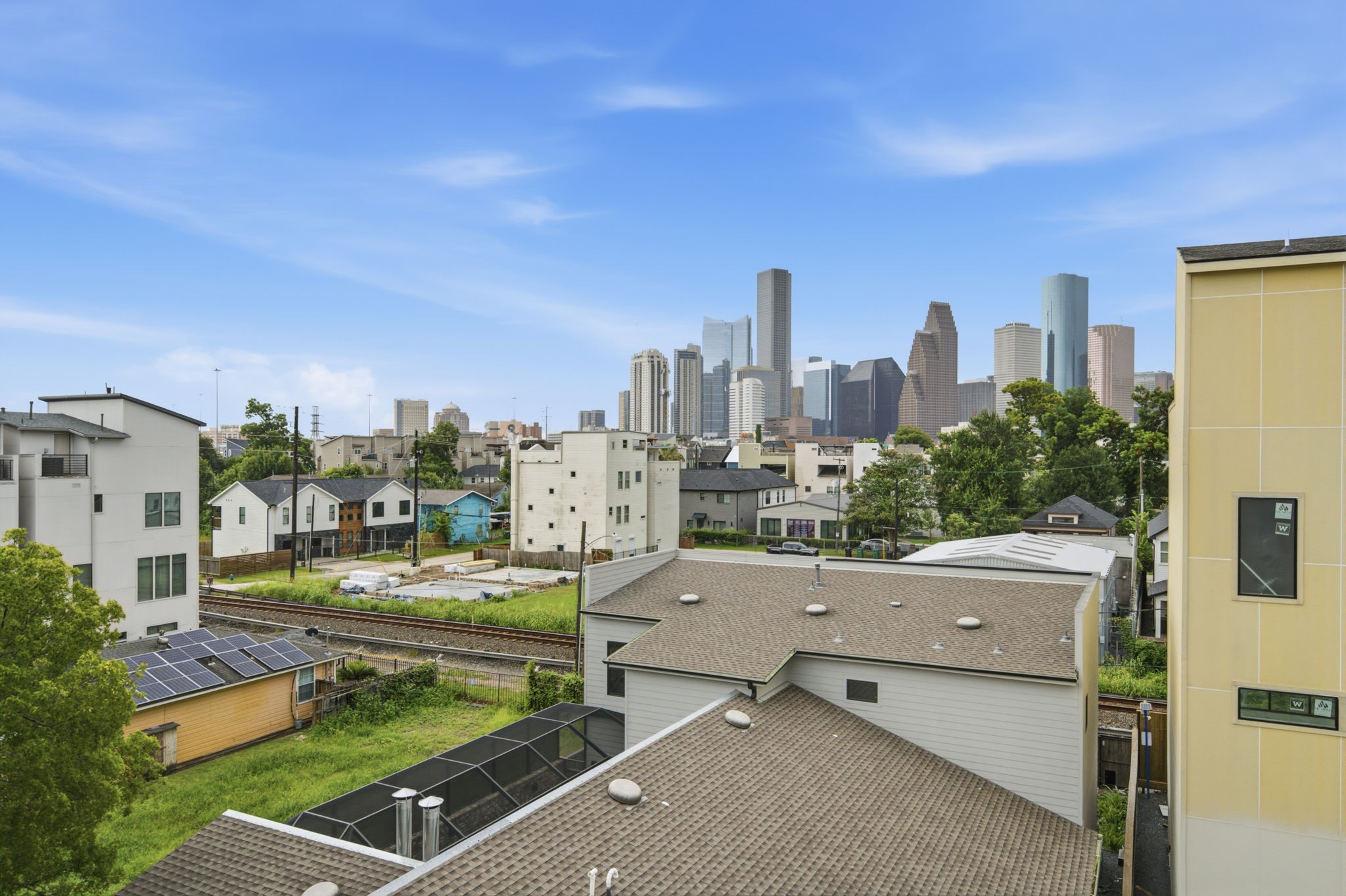 WELCOME HOME to 1215 Summer #C - 3 bed / 3 bath / 2 half baths / GAME ROOM + DOWNTOWN views! Hike & Bike Trail THREE BLOCKS away. This portion of the train line is a NO-HONK Zone. Live in FIRST WARD + within ARTS DISTRICT HOUSTON! Great location - great restaurants, coffeeshops + amenities (eg. Home Depot, Target, Total Wine) close by, 5-mins to DT Houston + easy access to freeways! NO HOA. Not in Floodplain