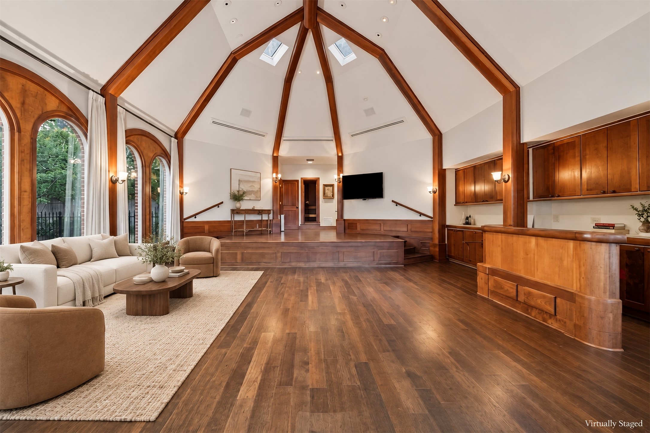 Virtually Staged - Pool house presents endless possibilities currently fitted with a kitchenette, stage, full bath, sauna, and changing room.