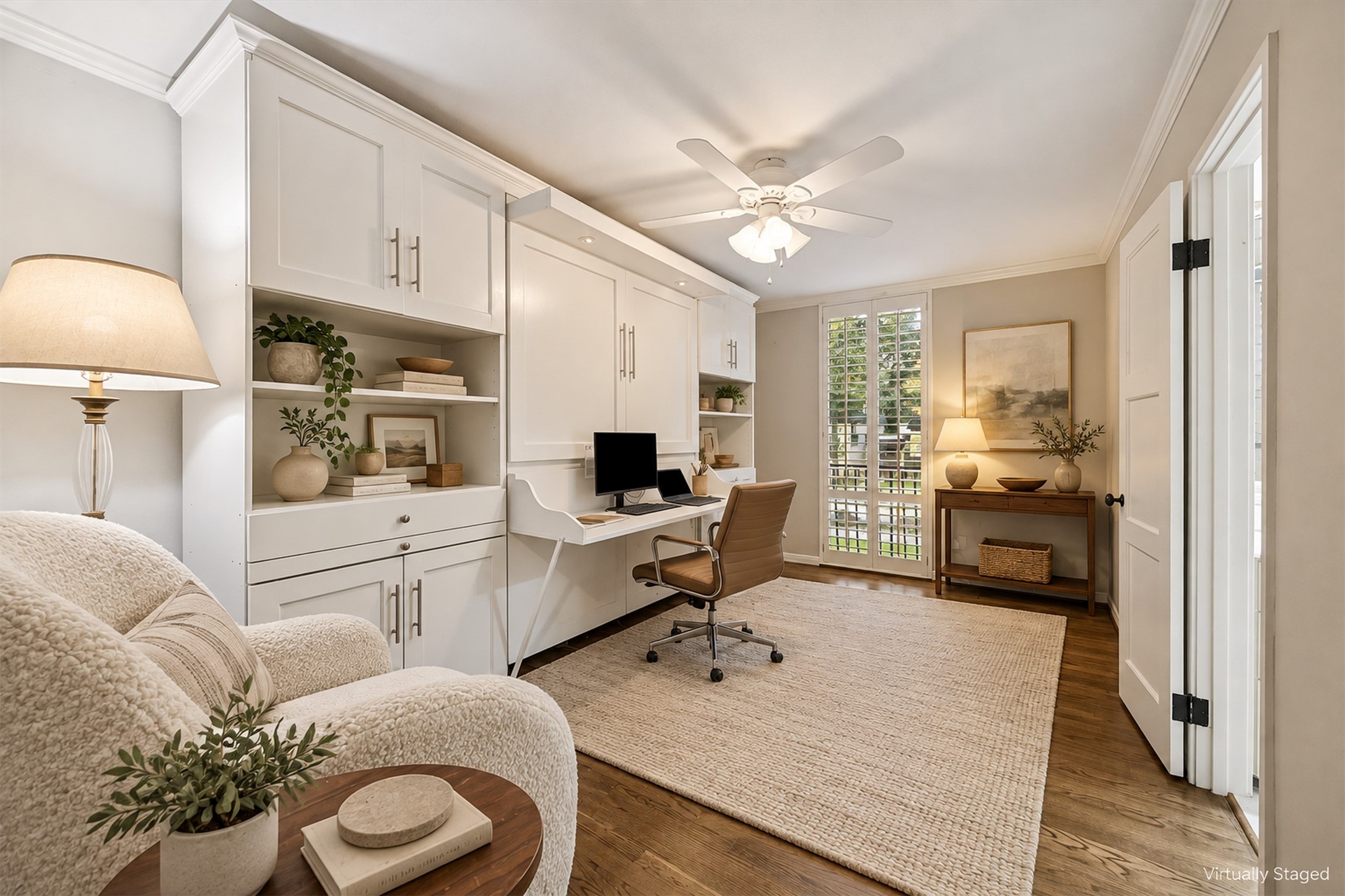 Virtually Staged - Secondary bedroom being used as a second home office, currently hosts a murphy bed/desk and features an en suite bathroom.