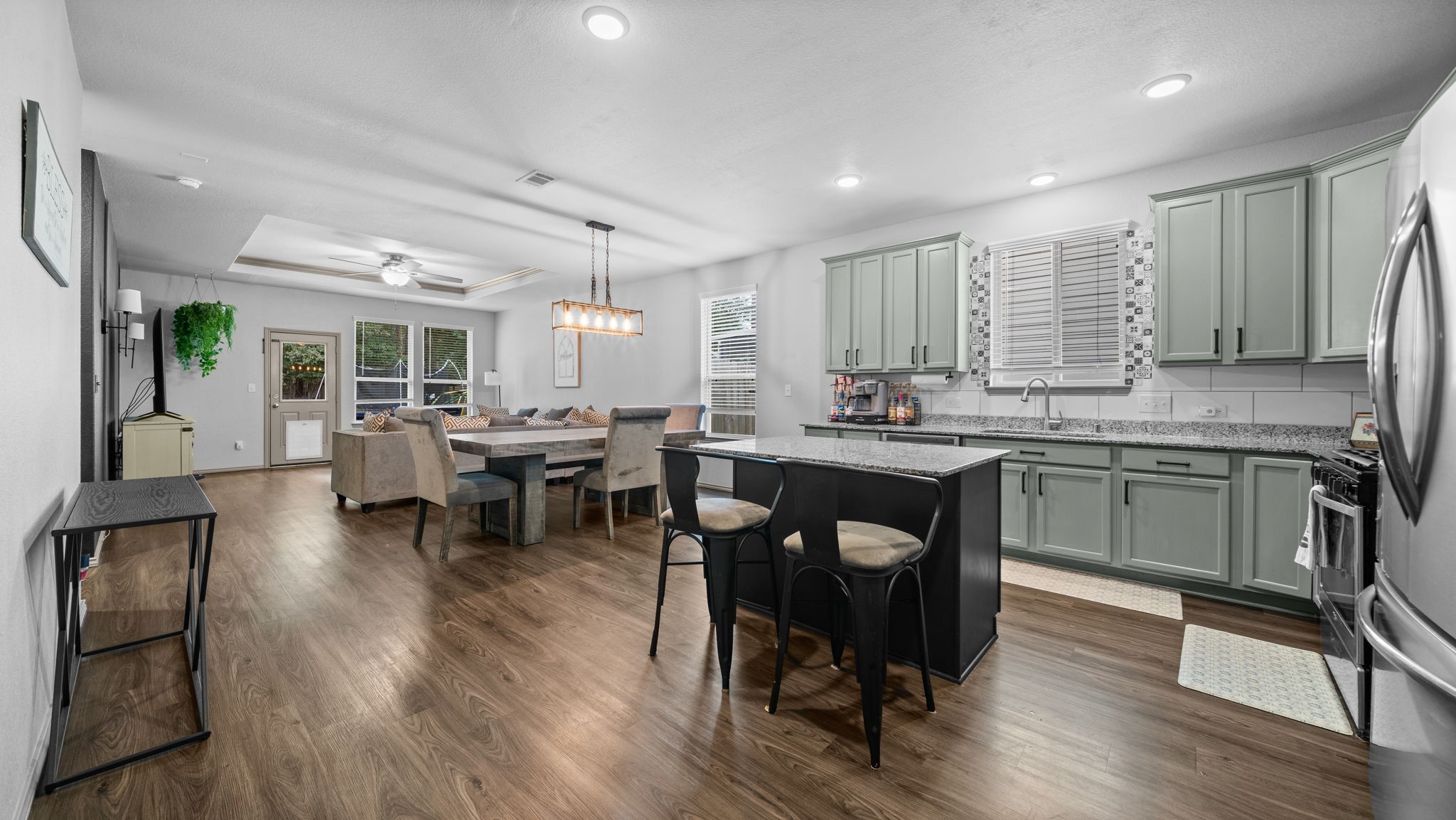 Enjoy the best of open-concept living! The kitchen, dining, and living areas connect beautifully, creating an inviting space for everyday comfort. Enjoy the best of open-concept living! The kitchen, dining, and living areas connect beautifully, creating an inviting space for everyday comfort.