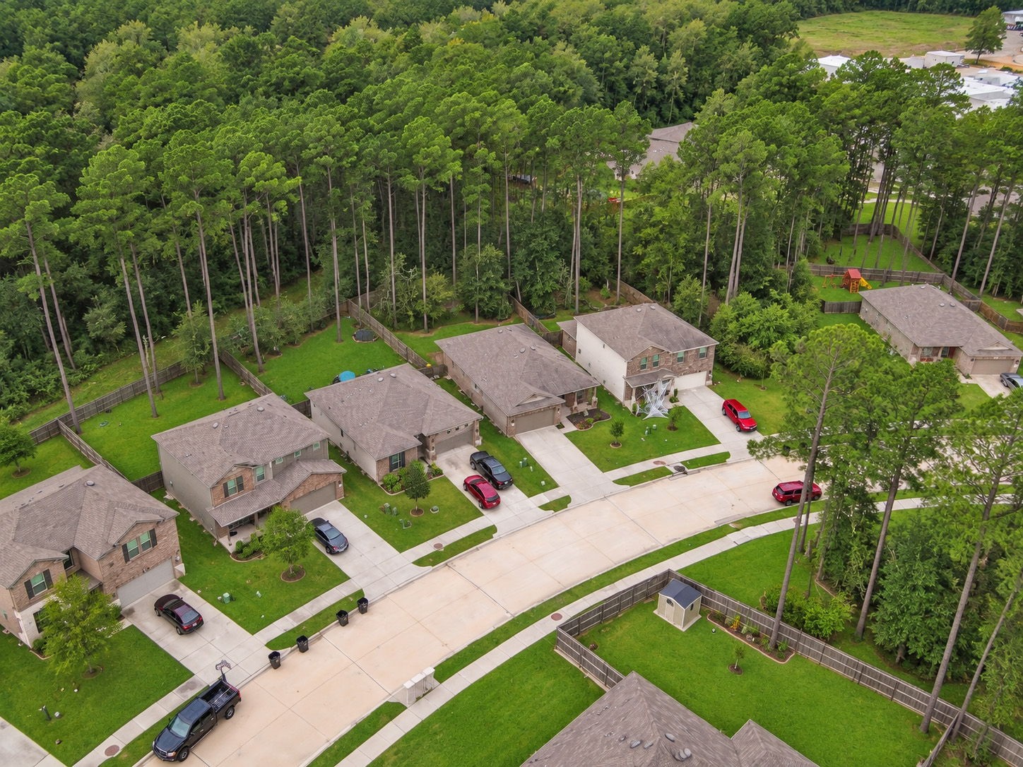 Enjoy the best of neighborhood living with a beautiful wooded backdrop! This home's backyard offers a refreshing natural setting with mature trees just beyond the fence.