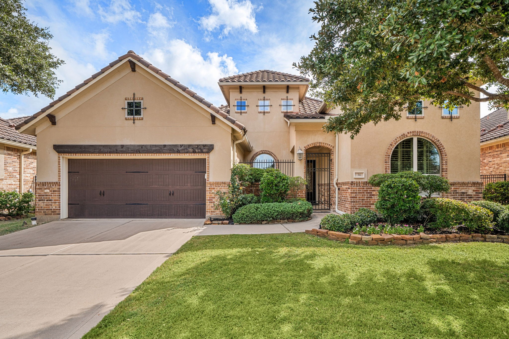 Welcome to 34 Edgemont Ct, a stunning Trendmaker-built home in the gated Lakes of Cross Creek Ranch community, offering a serene lake view and easy access to the neighborhood's amenities and walking trails.