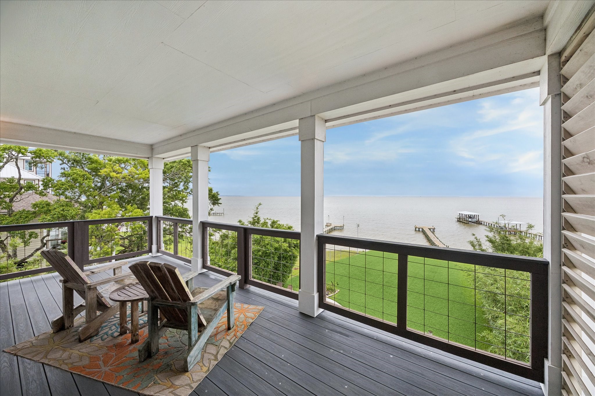 Primary balcony is a wonderful place to watch all the fabulous bay storms