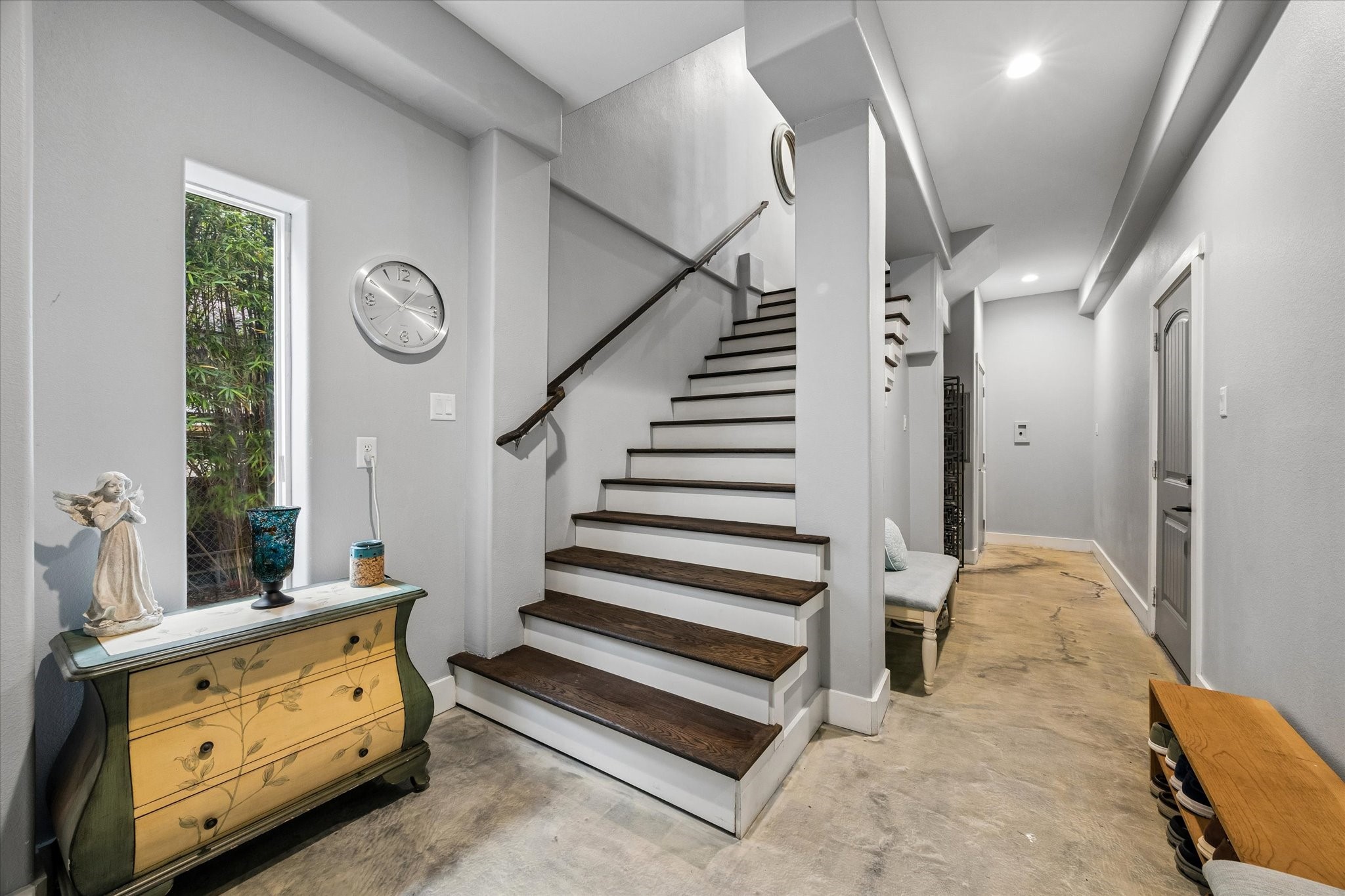 Mudroom with marble veined epoxy flooring