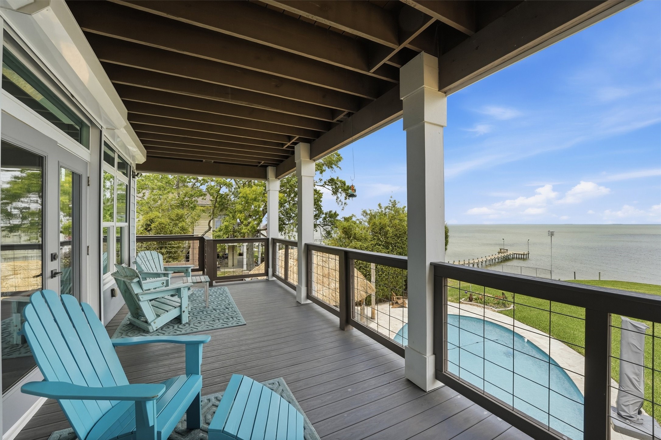 French doors lead to  main level balcony